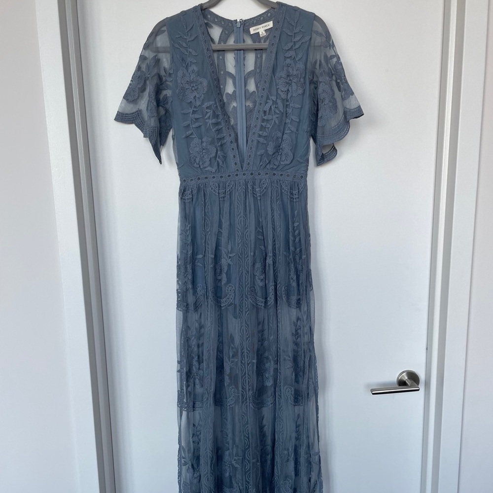 Resort season romper with low v-neck